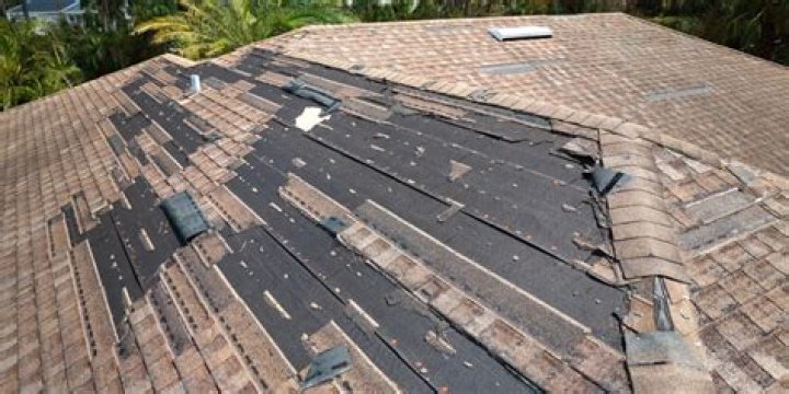 How do you repair curled shingles?