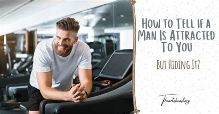 How do you tell if a man is attracted to you but hiding it at work?
