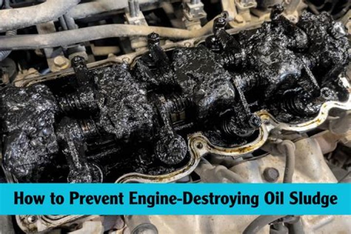 What causes engine oil to become sludge?