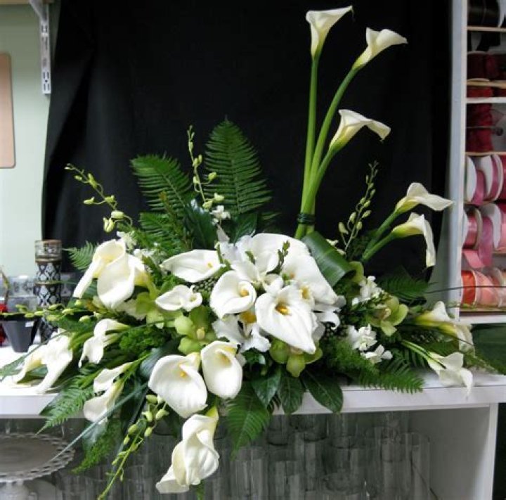 Why are lilies used at funerals?